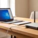 Bureau de teletravail avec ordinateur portable relie a la box par un cable Ethernet